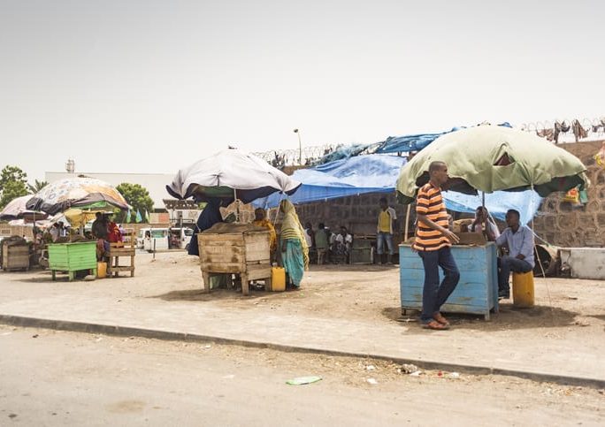 Street stalls with khat Khat or qat sales on the street in Djibouti City. Khat (Catha edulis) contains an alkaloid called cathinone, stimulant and amphetamine like.