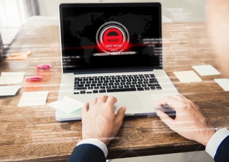 laptop-computer-with-the-system-being-locked-by-ransomware-picture-id1008108484 laptop-computer-with-the-system-being-locked-by-ransomware-picture-id1008108484