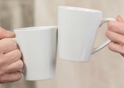 toast clink coffee cups friend ally 527523986 420 People holding cups of delicious coffee in office. Close-up of porcelain cups represented all together. Aroma concept.