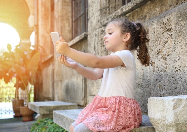 young-girl-is-taking-selfie-picture-id1009390398 young-girl-is-taking-selfie-picture-id1009390398