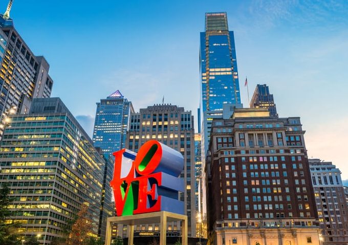 Love sculpture in downtown Philadelphia USA The landmark reproduction of Robert Indiana's Love sculpture located on John F. Kennedy Plaza in downtown Philadelphia, Pennsylvania, USA.