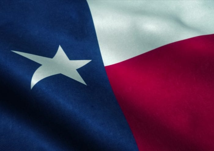 texas-state-flag-waving-in-the-wind-national-flag-of-texas-sign-of-picture-id1215778297