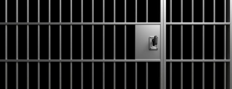 Prison interior. Jail bars and shadows, dark background. 3d illustration Prison bars. Jail bars and lock with a key, black background. Imprisoned, incarcerated, conviction concept, 3d illustration