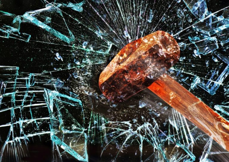 hammer-through-window-picture-id497653044 hammer-through-window-picture-id497653044