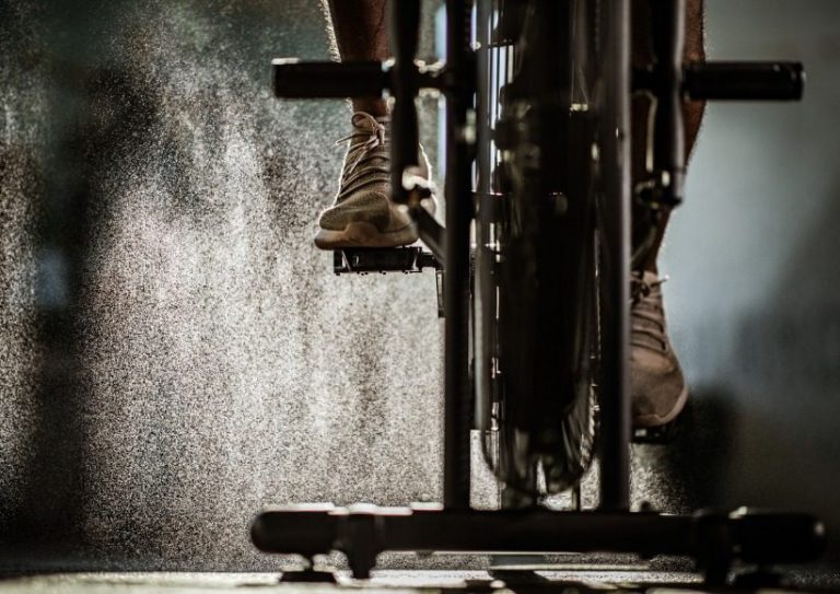 unrecognizable-male-athlete-exercising-on-stationary-bike-in-a-gym-picture-id1157745282 Peloton Under Scrutiny By the DOJ