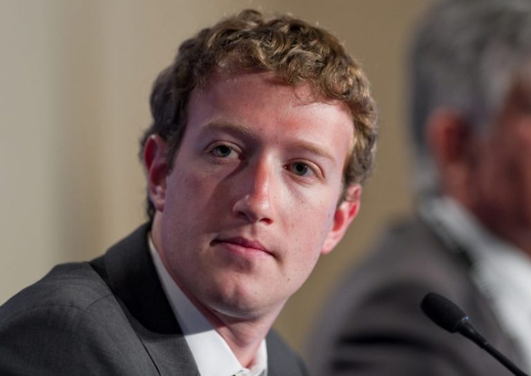 Mark Zuckerberg at G8 in Deauville, France Deauville, France - MAY 26, 2011 : Facebook CEO Mark Zuckerberg participates to a conference about web technologies during the french G8 in the north of France with the Google CEO Eric Schmidt, Hiroshi Mikitani, founder of Rakuten, the Businessman in advertising Maurice Levy and the Orange CEO Eric Richard.