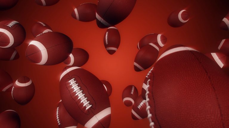 American Football balls falling Illustration featuring many footballs floating in space.