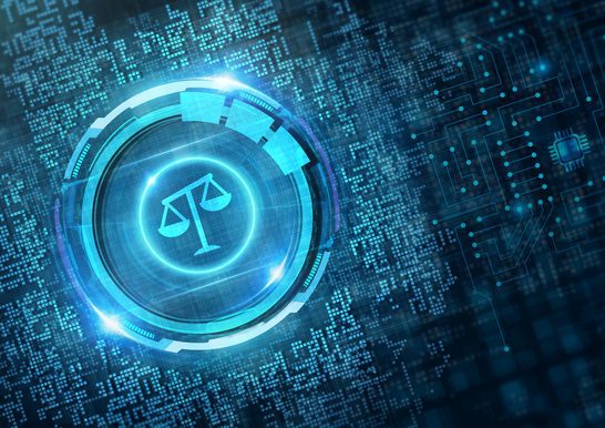 Business, Technology, Internet and network concept. Labor law, Lawyer, Attorney at law, Legal advice concept on virtual screen. A stylized rendering of electronic circuitry with justice scales superimposed over it.