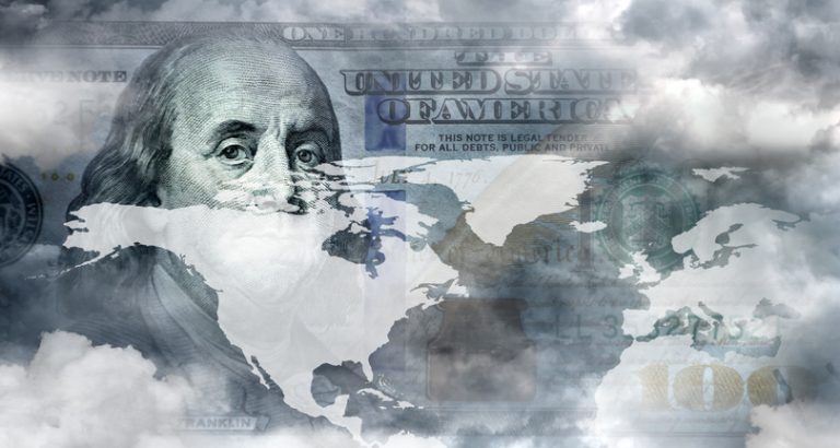 Clouds over part of a world map superimposed over a partial image of Ben Franklin on a hundred dollar bill.