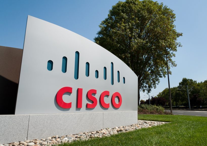 "San Jose, California, USA - September 9, 2011: Cisco Systems sign in front of one the many buildings that make up the company's headquarters in San Jose. Cisco is a publicly traded technology company (NASDAQ: CSCO) that designs and sells networking equipment. The company has over 60,000 employees globally and annual revenue of $43 billion as of 2011."