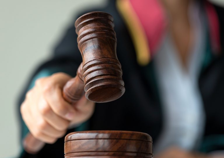 female-judge-holding-gavel-picture-id1281091727 female-judge-holding-gavel-picture-id1281091727