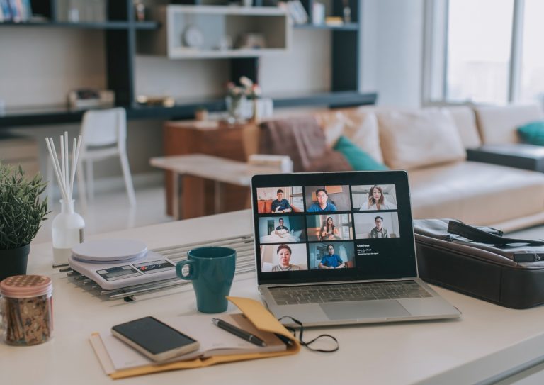 laptop-with-screen-video-conference-on-kitchen-counter-with-smart-picture-id1306856723 laptop-with-screen-video-conference-on-kitchen-counter-with-smart-picture-id1306856723