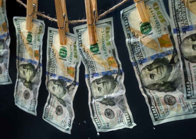 laundered-dollars-hanging-on-a-rope-picture-id467375870