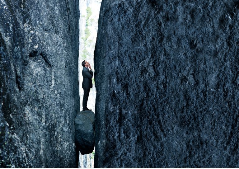 stuck-between-a-rock-and-a-hard-place-picture-id1288653784 stuck-between-a-rock-and-a-hard-place-picture-id1288653784