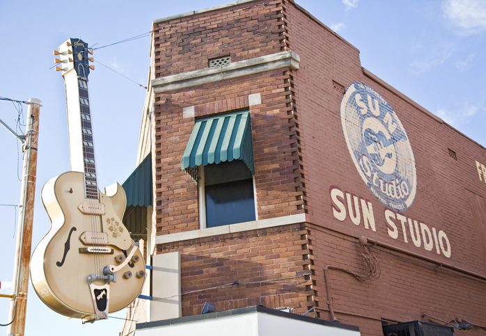 Huge Gibson guitar outside Sun Studio, Memphis, Tennessee, USA Gibson guitar 3-D sign hanging in front of Sun Studio.