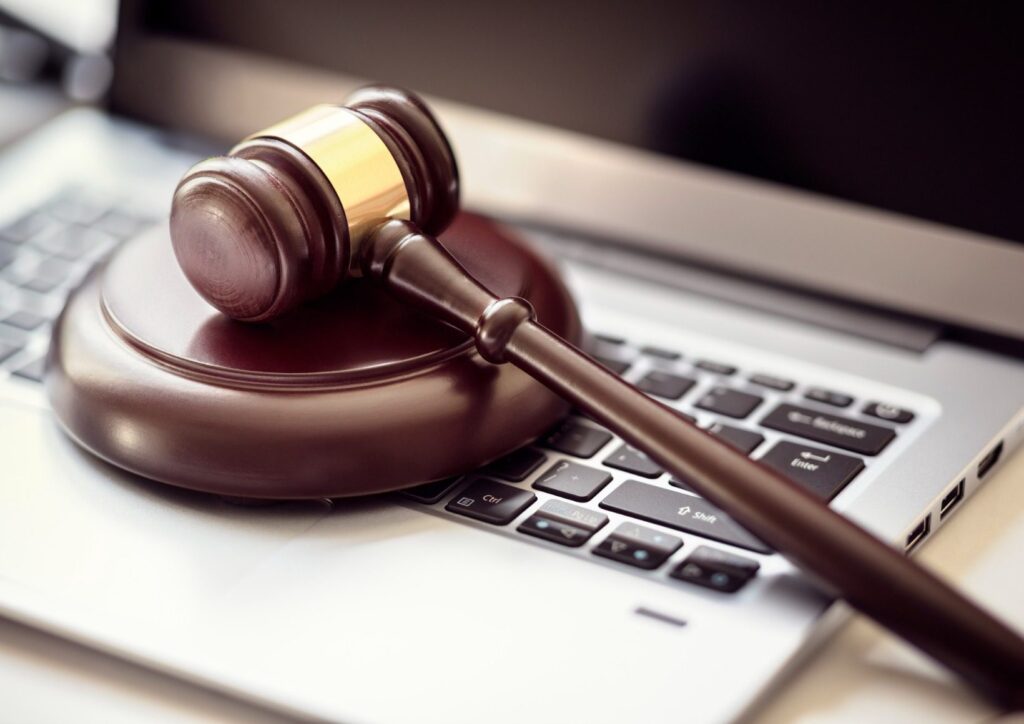 justice-gavel-on-laptop-computer-keyboard-picture-id931025190