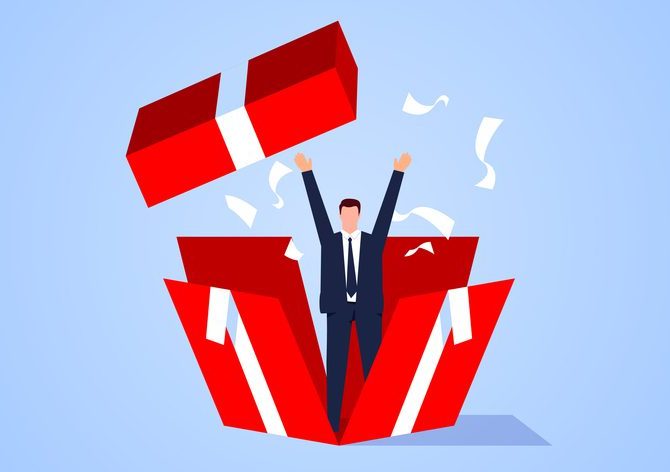 Surprise, the businessman broke the box from the inside and broke through Cartoonish man figure bursting out of a colorful box.