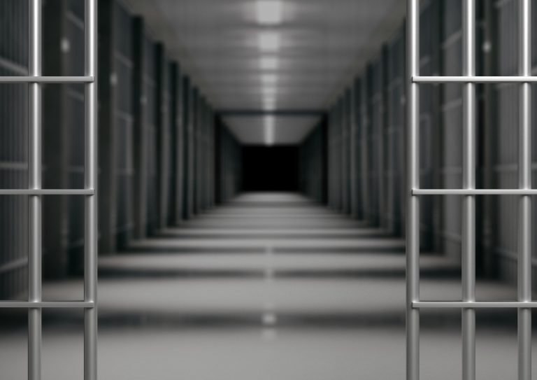 prison-interior-jail-cells-and-shadows-dark-background-3d-picture-id1207905653 prison-interior-jail-cells-and-shadows-dark-background-3d-picture-id1207905653