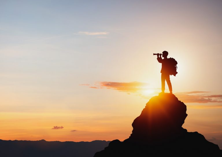silhouette-of-man-holding-binoculars-on-mountain-peak-against-bright-picture-id1383796215 silhouette-of-man-holding-binoculars-on-mountain-peak-against-bright-picture-id1383796215