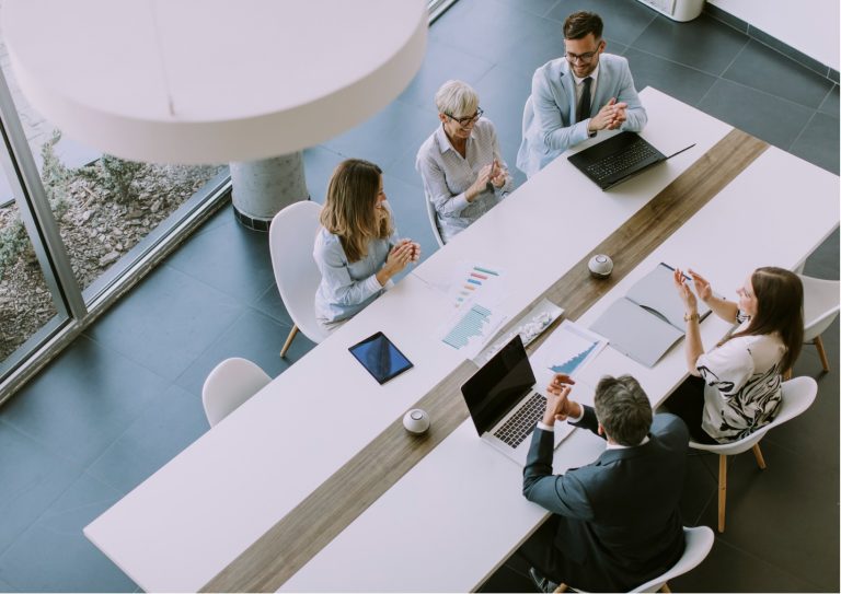 aerial-view-at-group-of-business-people-working-together-and-new-on-picture-id1358416956