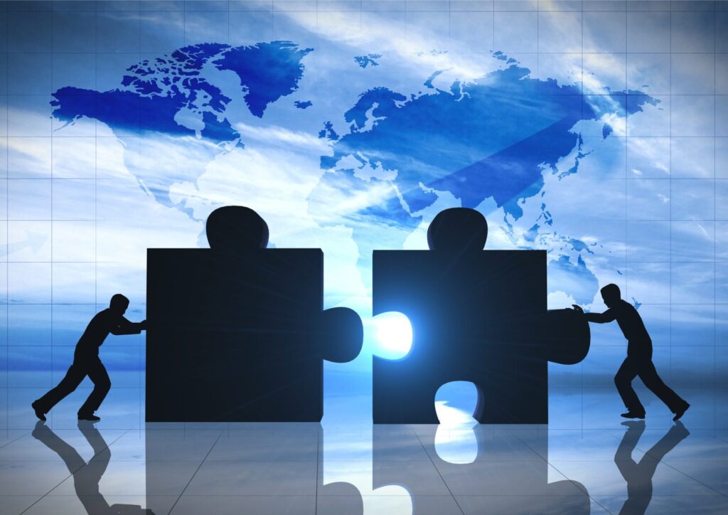 world-business-teamwork-puzzle-pieces-picture-id640307998