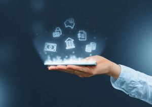 Illustration of a hand holding a cell phone, above which are icons symbolizing various kind of financial transactions