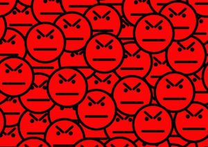 Stylized design/illustration of angry or dissatisfied oval faces.