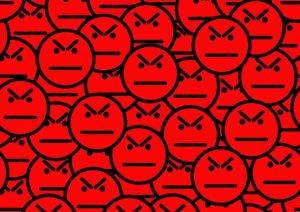 Abstract cartoonish design suggesting a crowd of dissatisfied or angry faces.