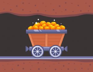 Old-fashioned mine railroad cart on tracks, with a heaping load of gold nuggets.