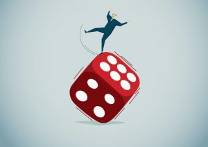 Illustration of a human figure balancing on the edge of a tipped die.