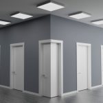 A somewhat surreal illustration of the intersection of two hallways, with a succession of door receding into the distance in two directions.