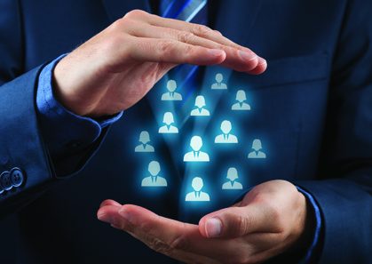 Customer or employees care concept Constructed Illustration showing, in front view, a guy with suit holding within his cupped hands icon representations of human figures, presumptively "employees."