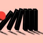 falling domino and businessman