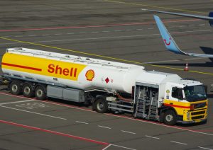 Shell oil tank truck on an airport runway.