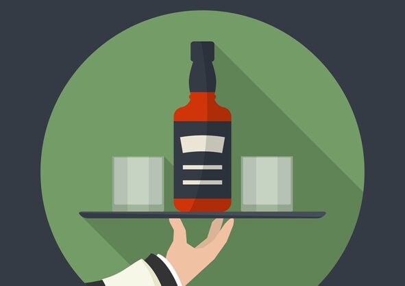A bottle of what could be whiskey on a tray with two glasses, held up by the arm of a waiter.