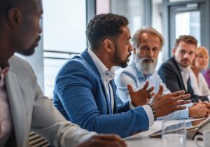 executive-team-listening-to-contrary-views-from-colleague-picture-id1272326797
