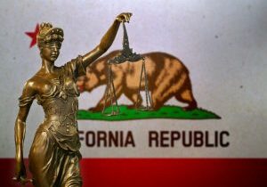 lady-justice-before-a-flag-of-california-picture-id1154922116